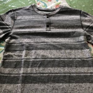 A gray striped Tee